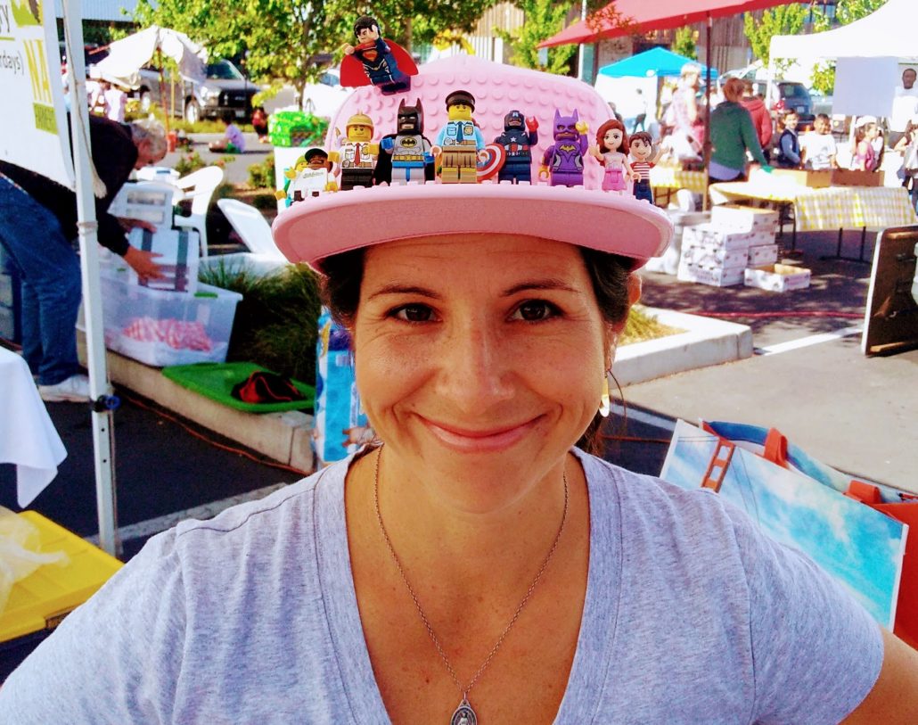 A person is donning a pink hat.